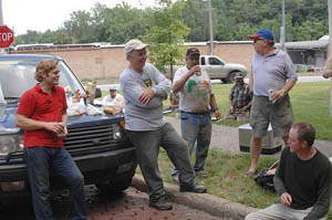 L to R are Dr. Andrew Park,, Curt Watkins, Miguel Sanchez, John Frick and Randy Moore critiquing the brats John Frick grilled to fortify all for the afternoon. Final Judgment: A brat never tasted better!