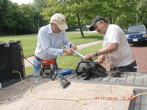 Long time neighborhood activist Manuel Lopez (back again from Volker for the third time) anticipated the skill level of the many amateurs and came equipped with his tool box. He and Miguel from Lawrence kept the chain saws sharpened and performing. Manny and Rick Leitig have also participated in planning meetings hosted by Miles Krivena and have first hand information about the aspirations for Roanoke Park.