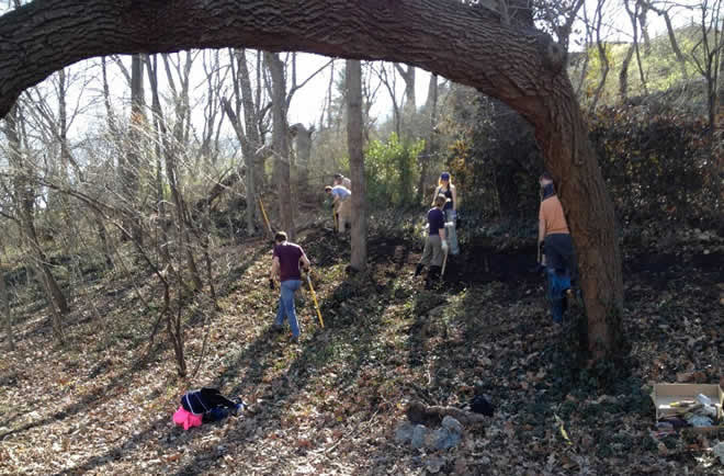 The trailbuilders at work on Roanoke Park's newest amenity. Thanks to BikeWalkKC.org for the picture. (See Information > Photo Galleries > Event Photos, for more pics.)